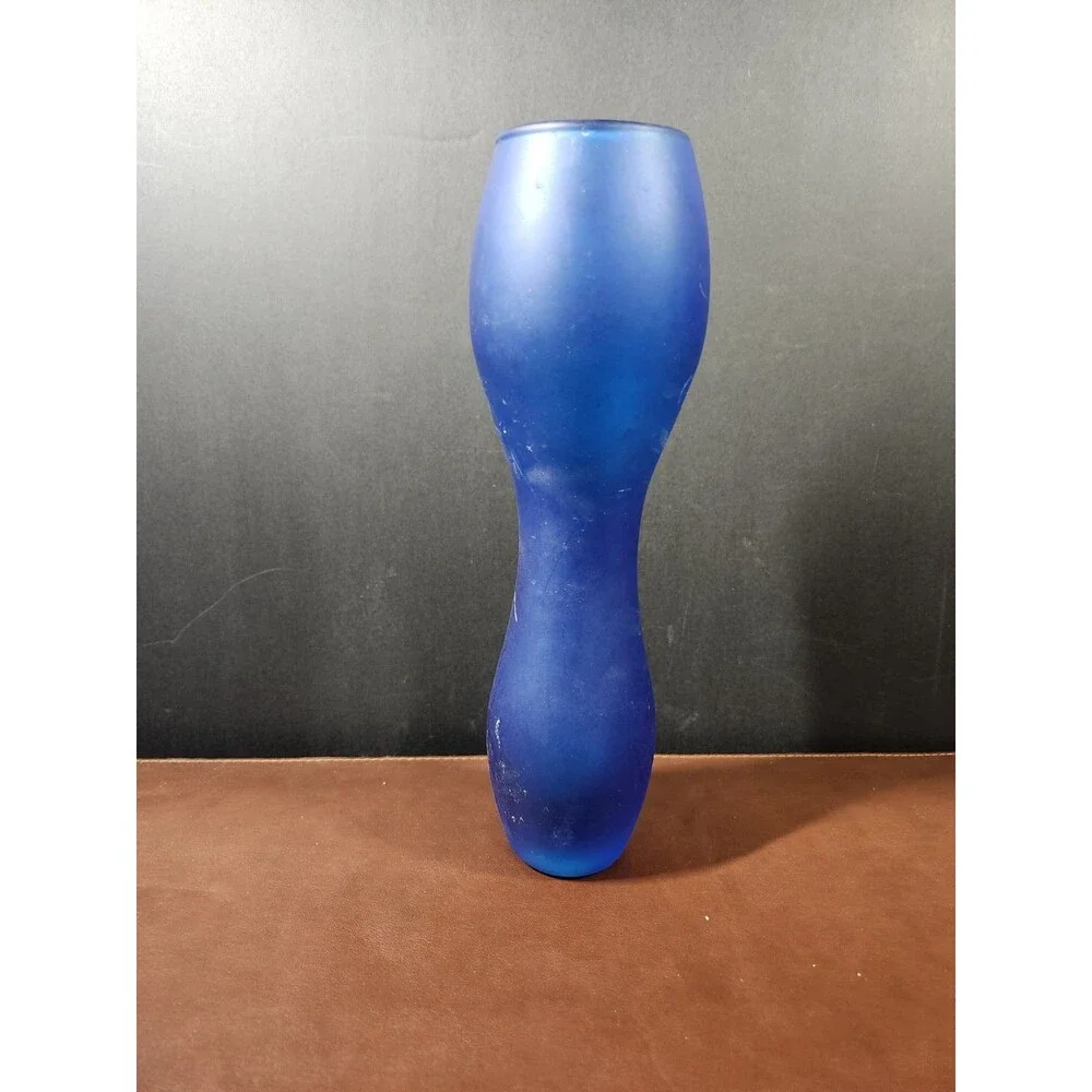 IKEA Salong blue glass vase, designed by Johanna Jelinek, features a...